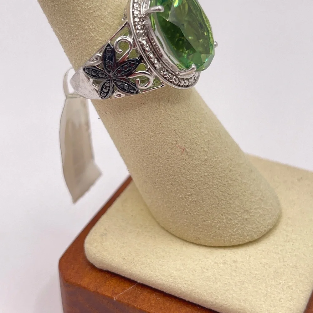 Simulated peridot in sterling silver with black rhinestone accents